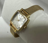 Tissot T058109A Quartz Silver Dial Gold Plated Bracelet Lady Watch