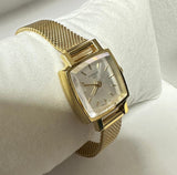 Tissot T058109A Quartz Silver Dial Gold Plated Bracelet Lady Watch