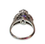 PT900  Ballerina Cluster Ring Oval Deep Blue Sapphire Framed By Tiered Halo Of Tapered Baguette And Round Diamonds 9.0G Size 11