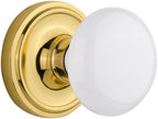 Nostalgic Warehouse 702208 Classic Rosette With White Porcelain Door Knob Passage 2.375in Polished Brass