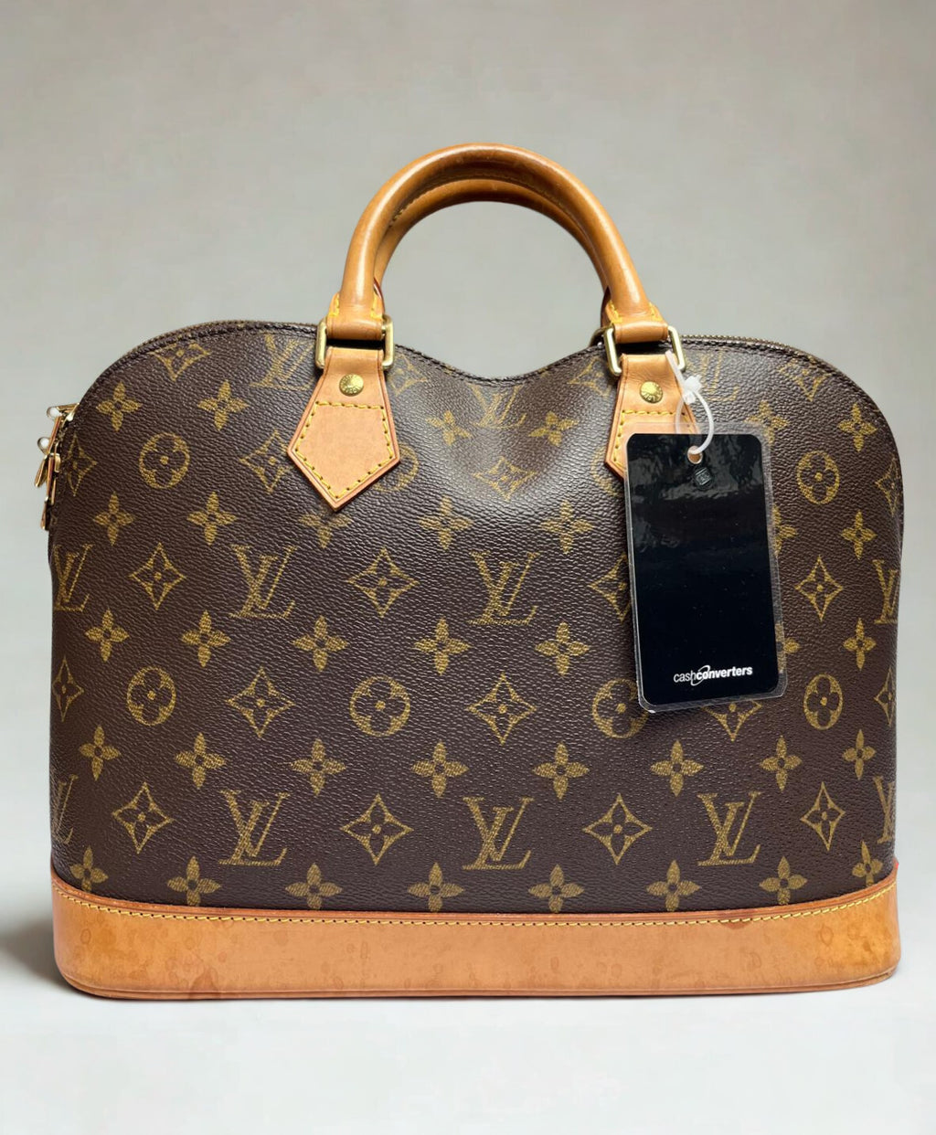 Louis Vuitton Alma PM Handbag Monogram Coated Canvas Vachetta Leather Trim