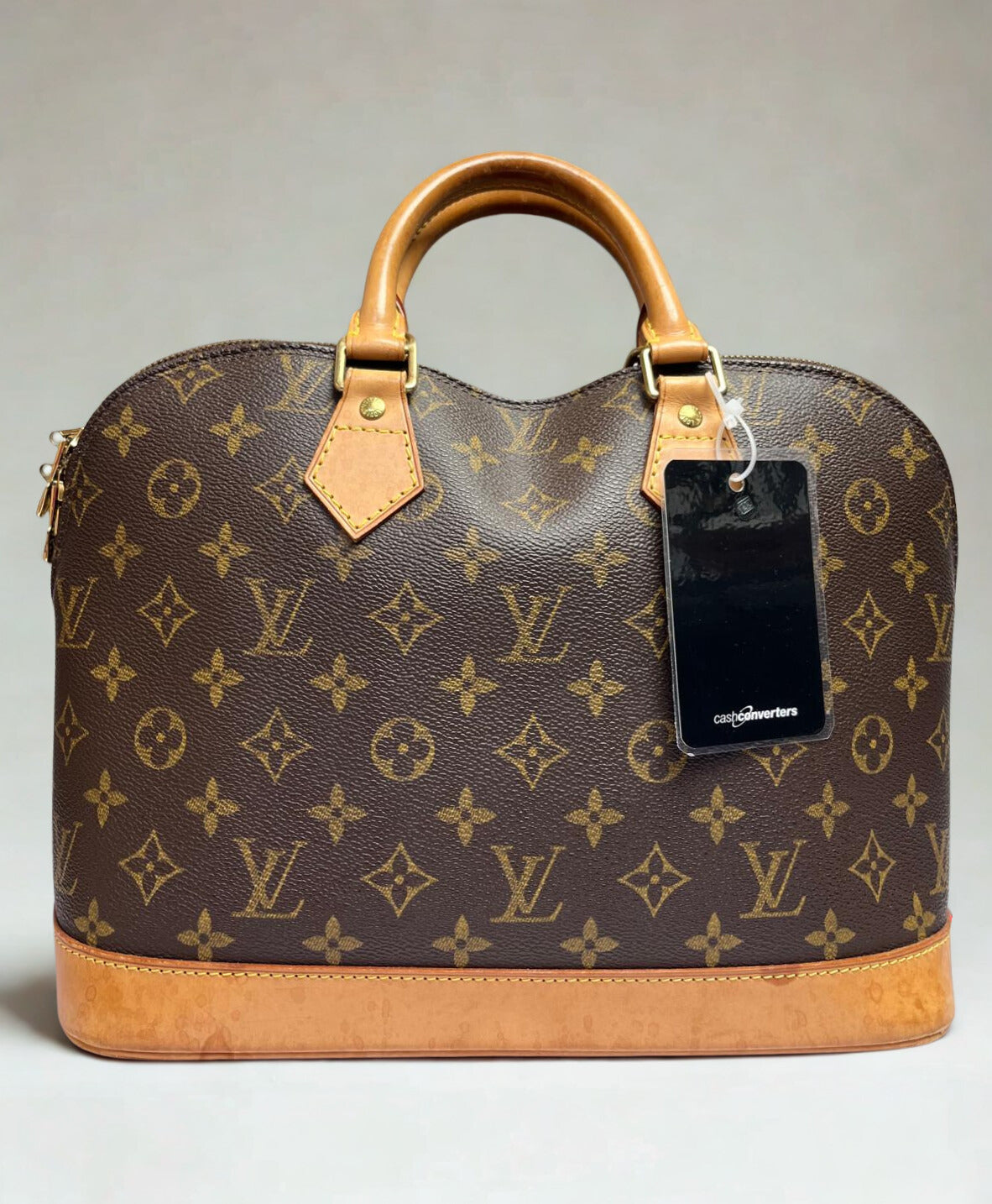 Louis Vuitton Alma PM Handbag Monogram Coated Canvas Vachetta Leather Trim