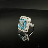 White gold ring on sale with blue topaz