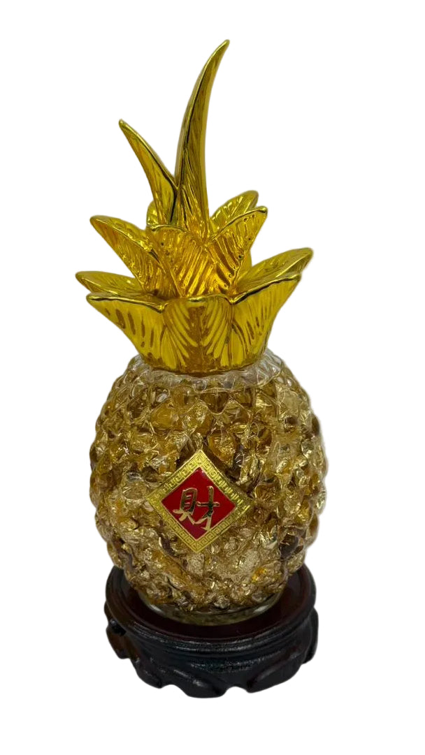 Glass Pineapple with Gold Leaves in Liquid Main image