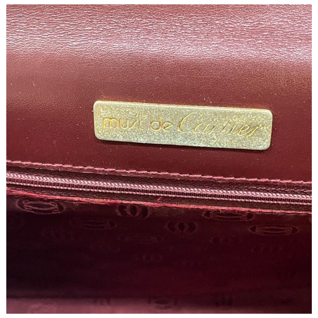 Cartier Must De Cartier Burgundy Leather Clutch Bag