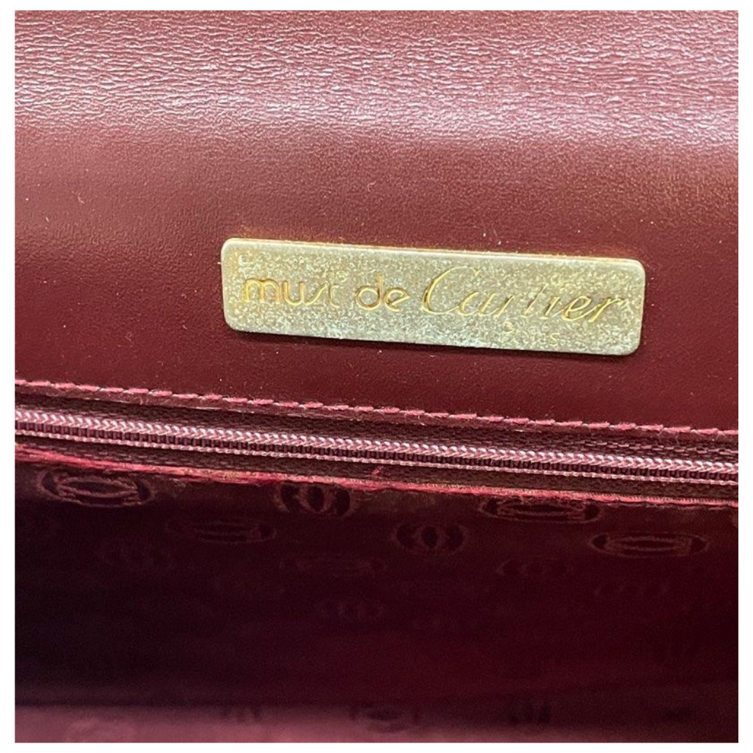Cartier Must De Cartier Burgundy Leather Clutch Bag