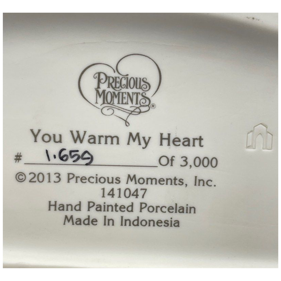 Precious Moments Figurine â€œYou Warm My Heartâ€ 141047