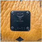 MCM Stark backpack in Visetos Cognac and Black Nappa Leather