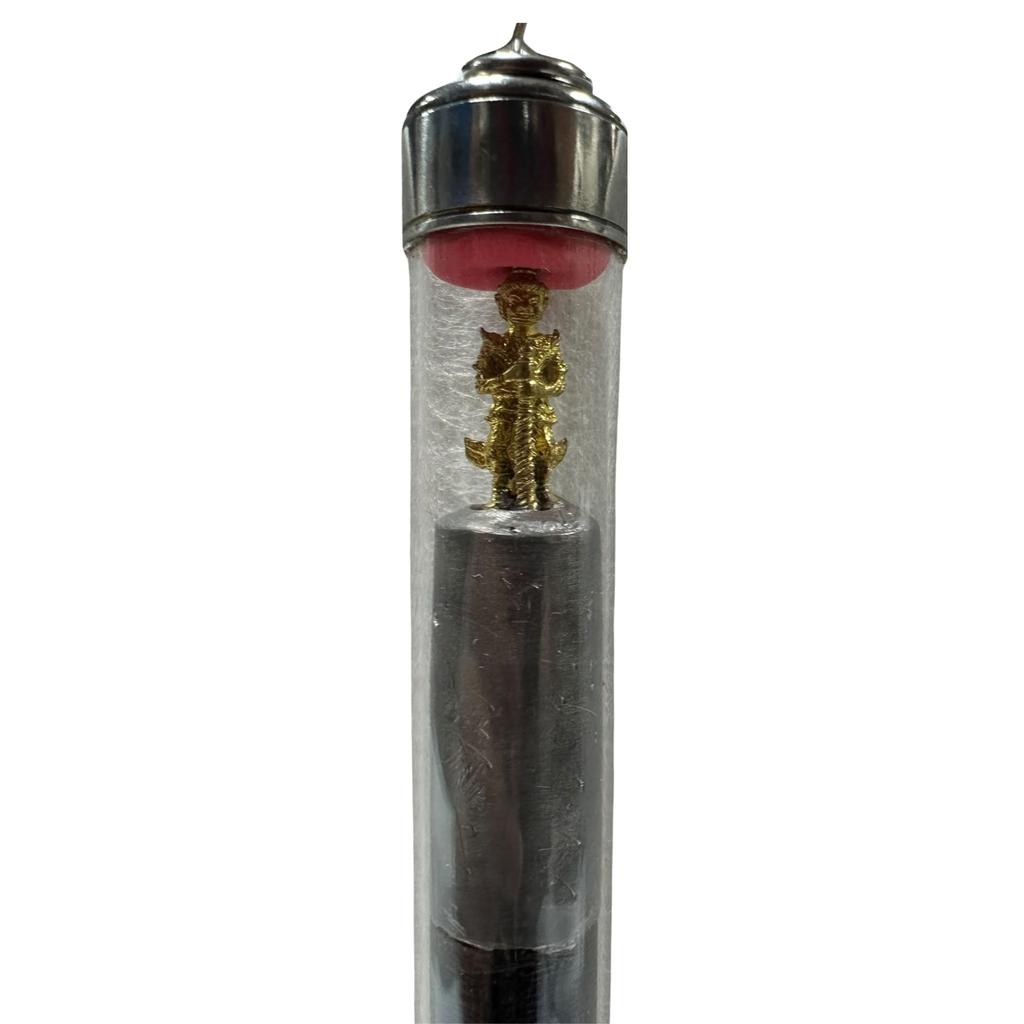 Thai amulet known as a Takrut containing a miniature Loi Ongk statuette of Thao Wessuwan