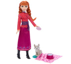 Mattel Disney Frozen Anna Fashion Doll & Wolf Cub Figure with 4 Accessories Including Animal Bed & Blanket, Inspired by Animals of Arendelle