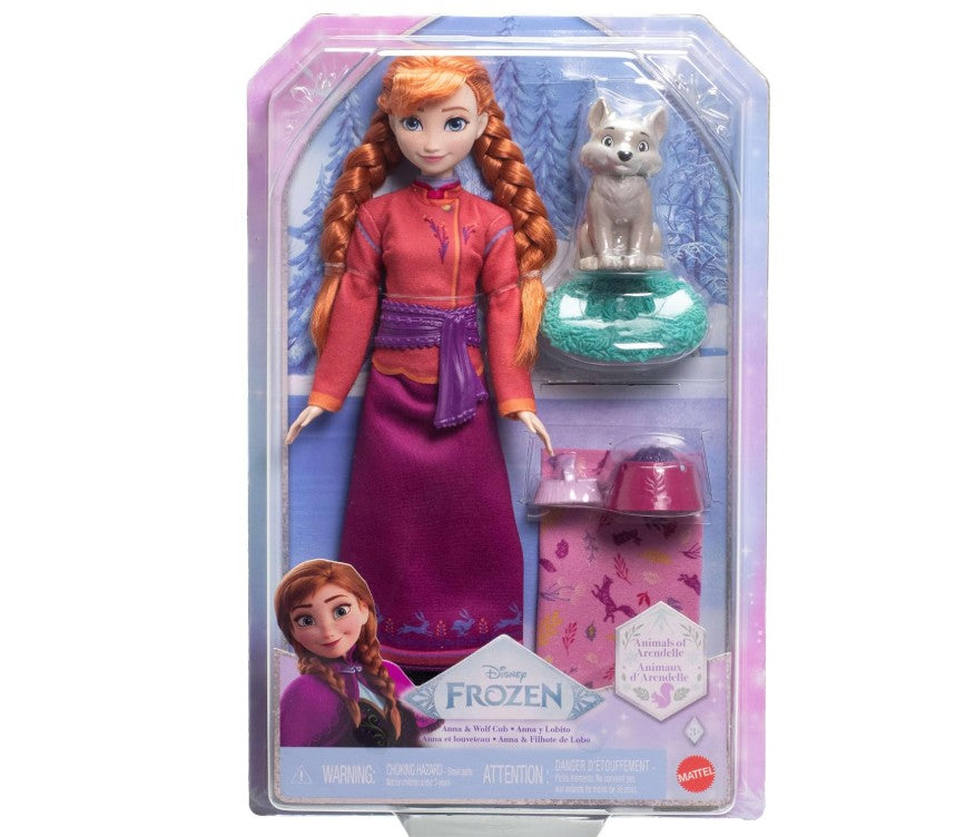 Mattel Disney Frozen Anna Fashion Doll & Wolf Cub Figure with 4 Accessories Including Animal Bed & Blanket, Inspired by Animals of Arendelle