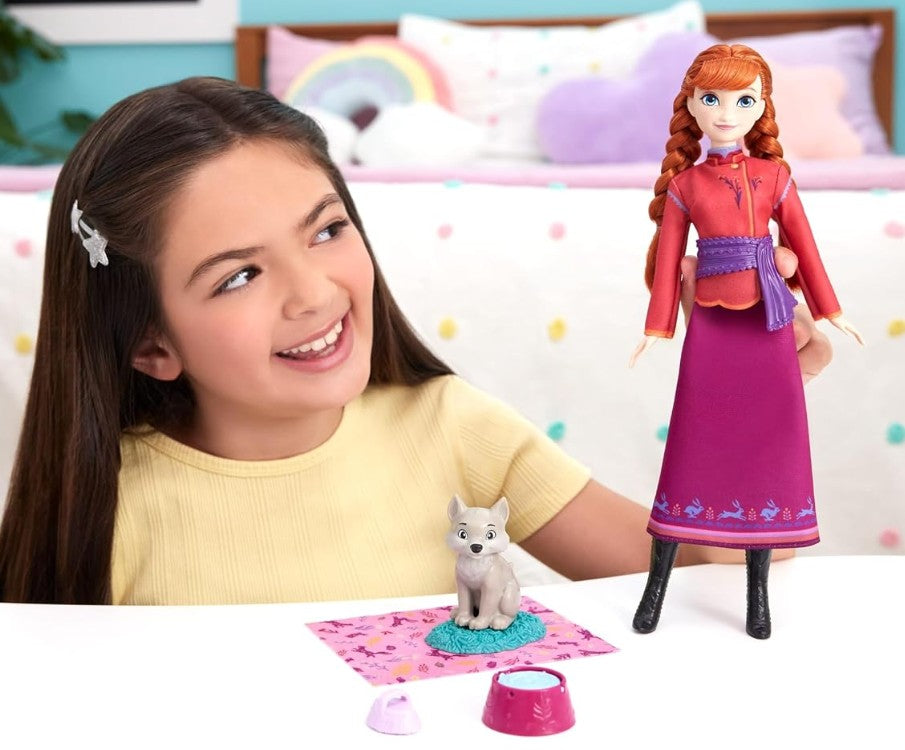 Mattel Disney Frozen Anna Fashion Doll & Wolf Cub Figure with 4 Accessories Including Animal Bed & Blanket, Inspired by Animals of Arendelle
