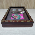The Singapore Mint Peranakan collection stamp and spoon