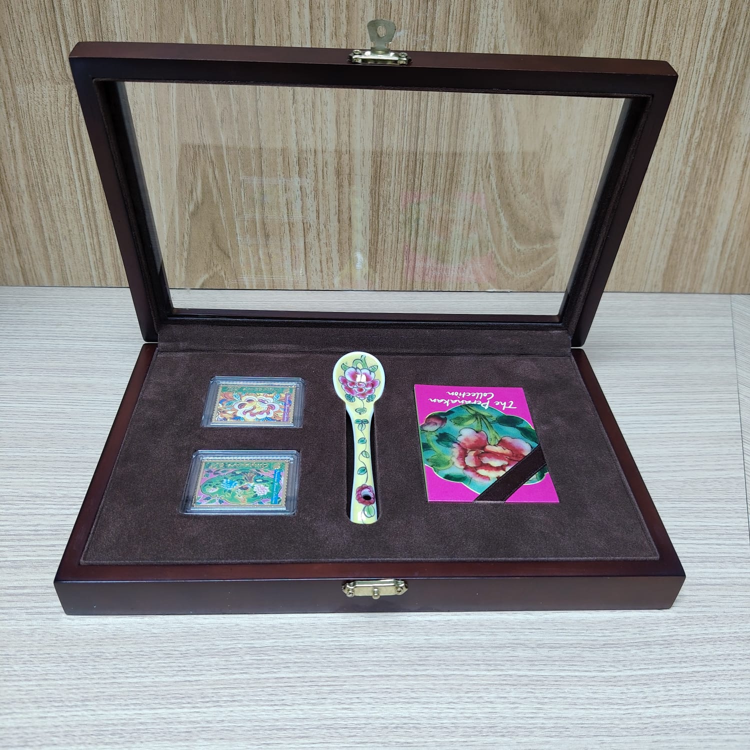 The Singapore Mint Peranakan collection stamp and spoon Main image