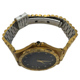 Vintage Bulova  gold-plated Watch featuring a black dial with Crystal hour markers and a Roman numeral bezel