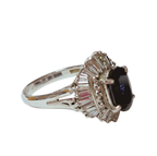 PT900  Ballerina Cluster Ring Oval Deep Blue Sapphire Framed By Tiered Halo Of Tapered Baguette And Round Diamonds 9.0G Size 11